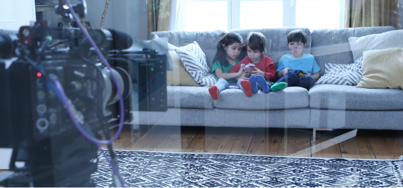 Kids sitting on a couch